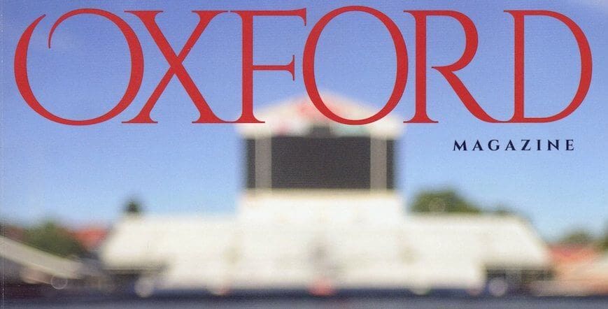 Blurred stadium under Oxford Magazine title.