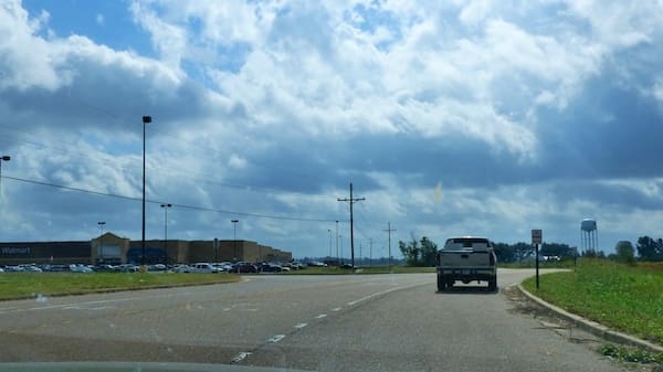 Recycle bins are located in the Walmart parking lot.