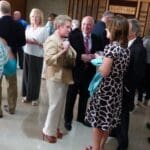 Group of people at a gathering.