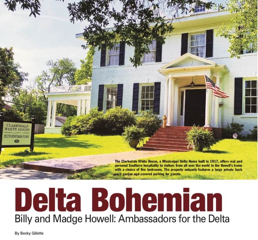 Historic white house with green landscape