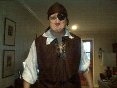 Pirate-themed costume with brown vest