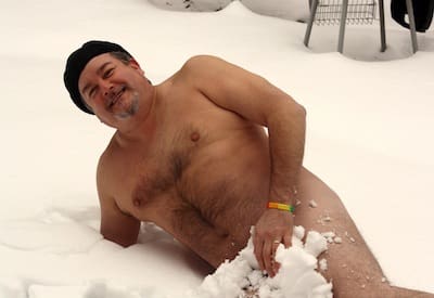 Smiling man enjoying snow, outdoors