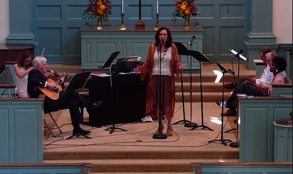 Musician performing on church stage