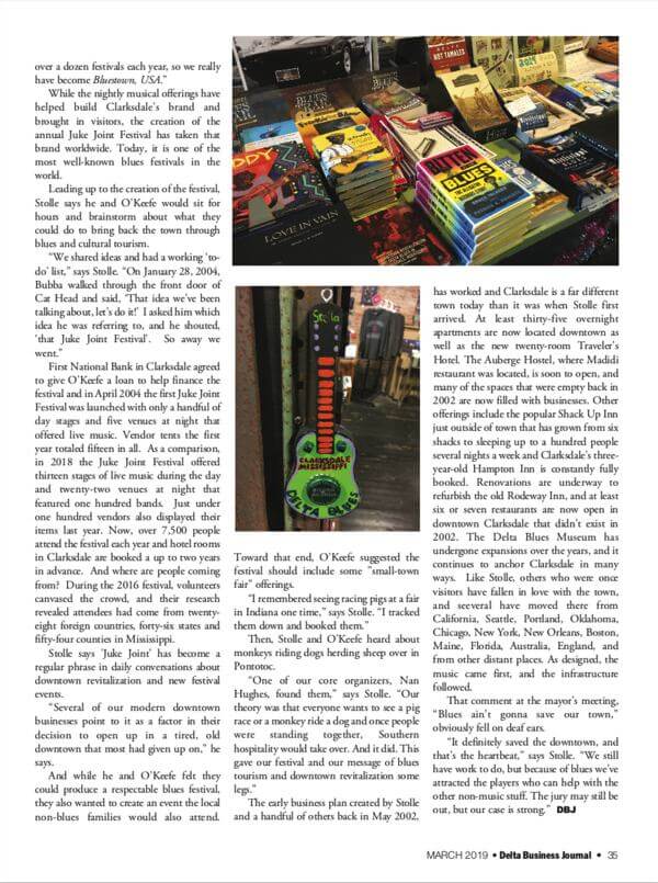 Magazine page with books and guitar