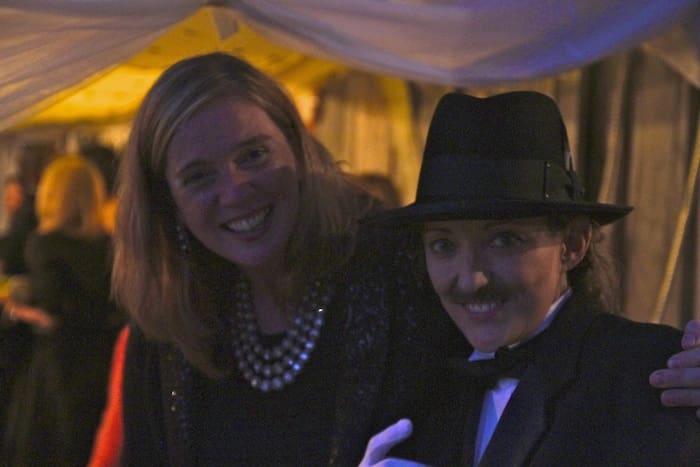 Smiling people at a formal event