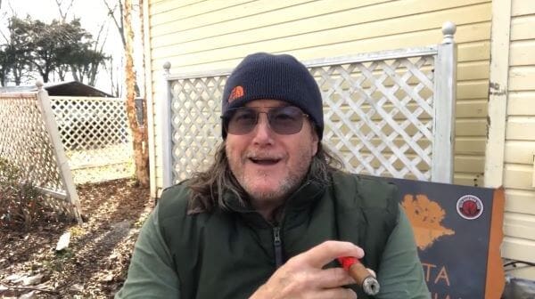 Smiling man outside in winter clothes