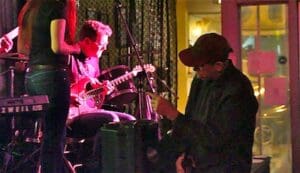 Watermelon Slim listening to Pristine at Bluesberry Cafe. Photo by Delta Bohemian