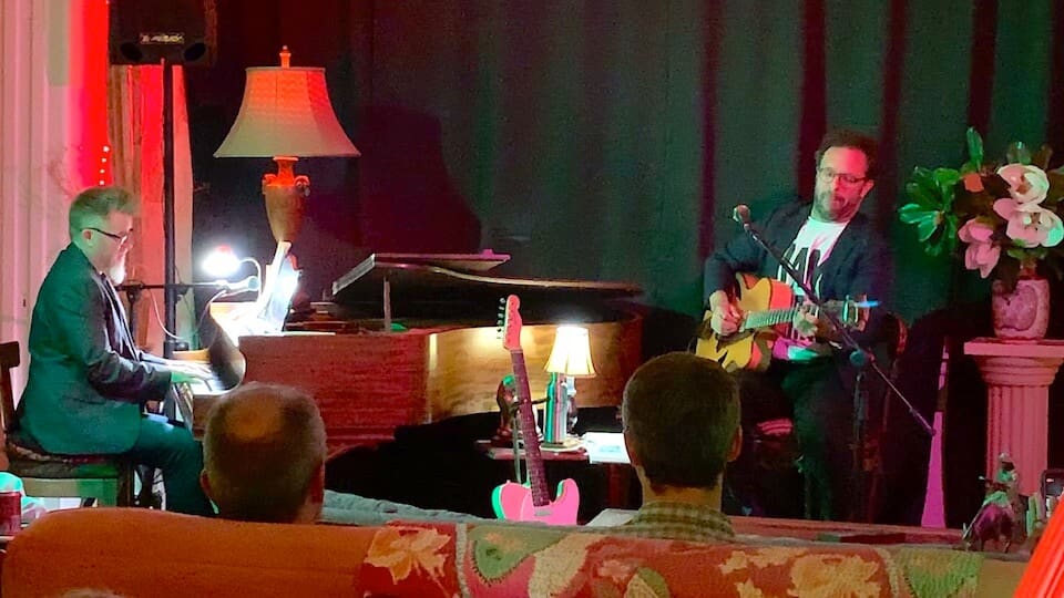 Musicians playing in a cozy setting