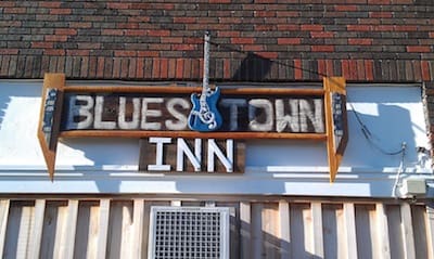 Blues Town Inn sign with guitar