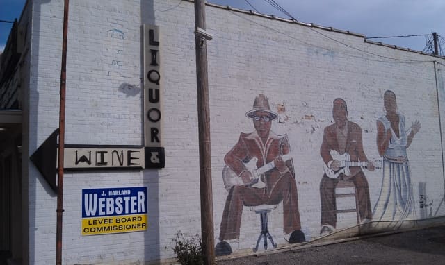 Downtown Wine and Liquor sign on side of building in Clarksdale. Photo and signage by Delta Debris.