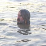 Driftwood Johnnie himself (aka John Ruskey) taking a dip in his beloved Mississippi River. Photo by The Delta Bohemian