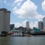 New Orleans skyline with a riverboat.