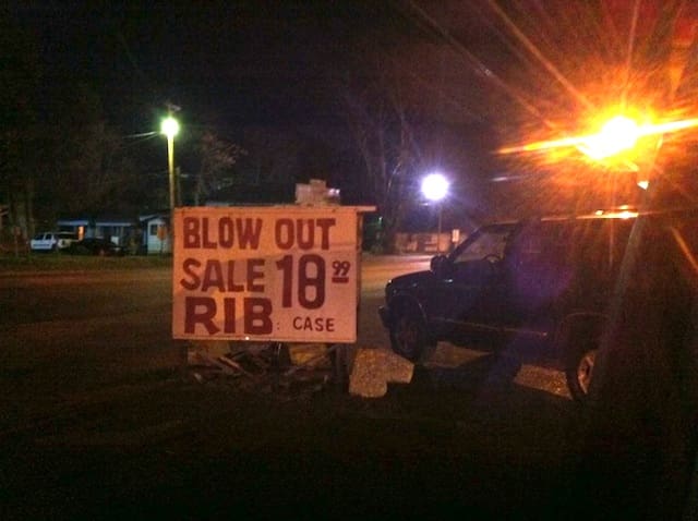 Signs on corner of State Street and Sunflower Avenue in Clarksdale. Photo by Delta Bohemian
