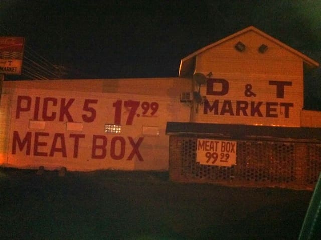 Signs on corner of State Street and Sunflower Avenue in Clarksdale. Photo by Delta Bohemian
