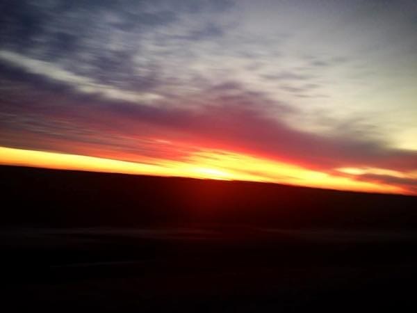 Glowing sunset with dark clouds