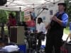 Musicians playing under a canopy