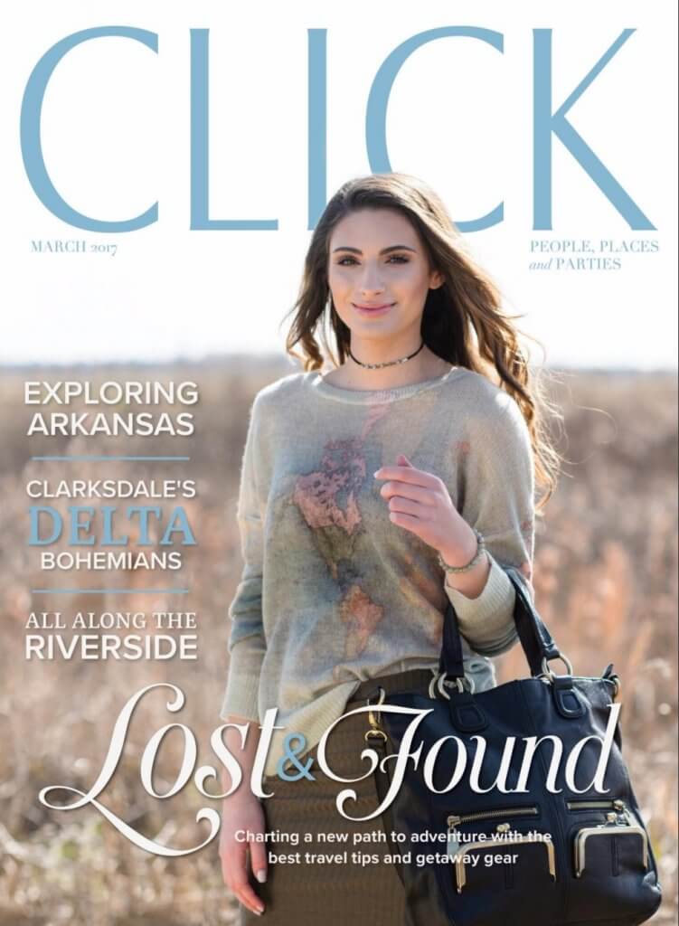 Smiling woman with handbag on magazine cover