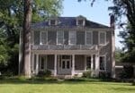 Historic Colonial-style two-story house with porch