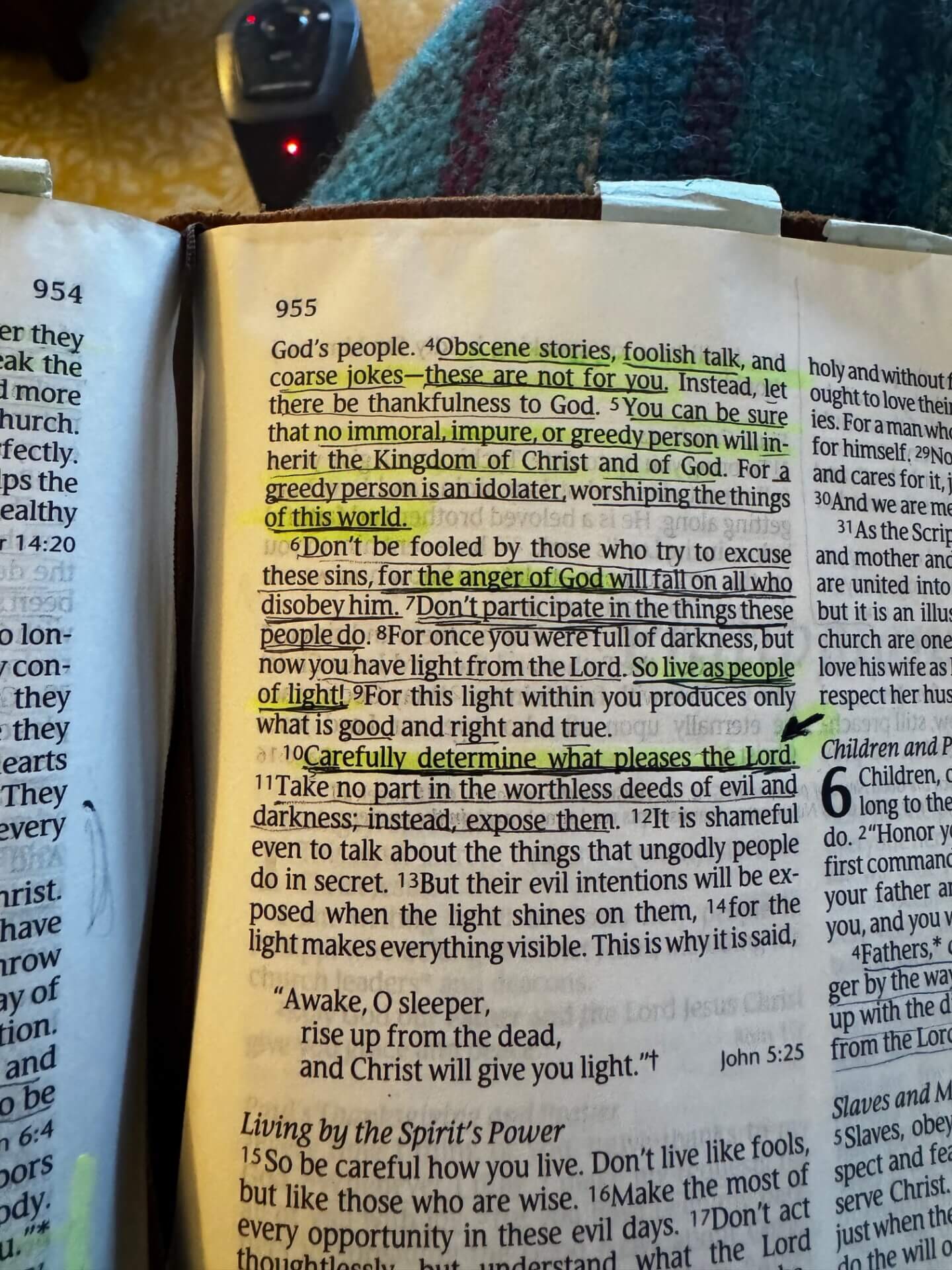 Open Bible with highlighted passages and bookmark